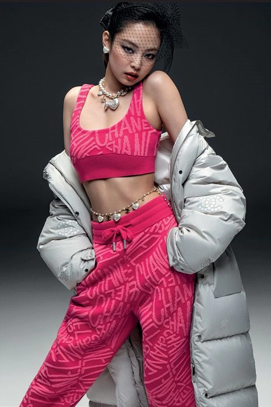 Chanel Ambassador Jennie Kim in a red crop top and skirt at Chanel